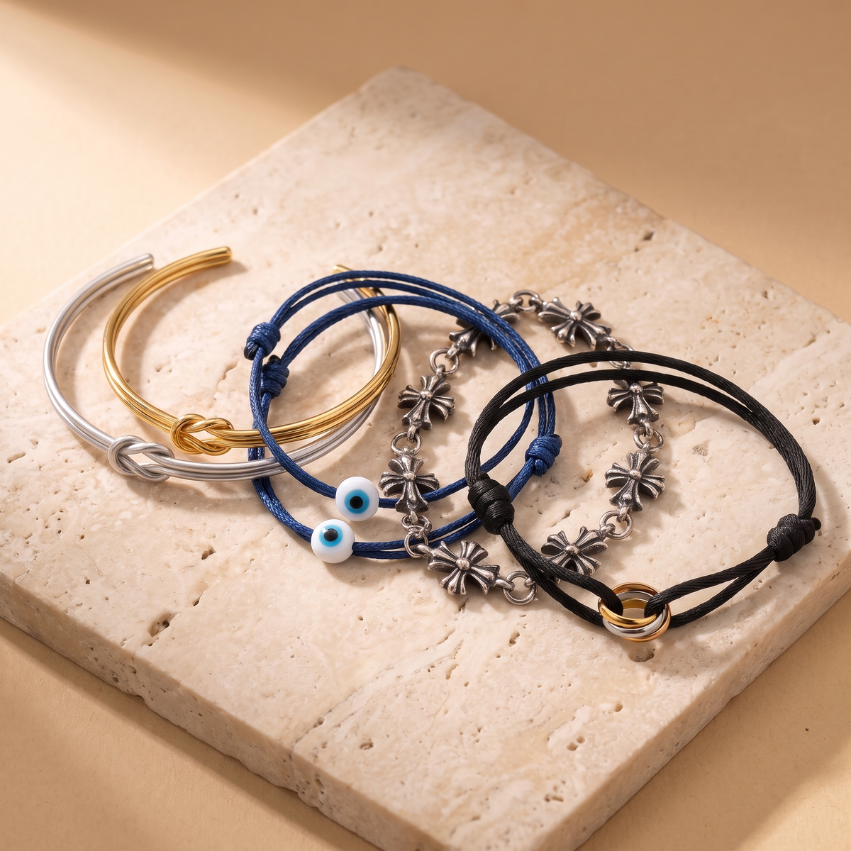 BLK LABEL bracelets collection - cross-link and knot bangle bracelets, candid coastal town shot